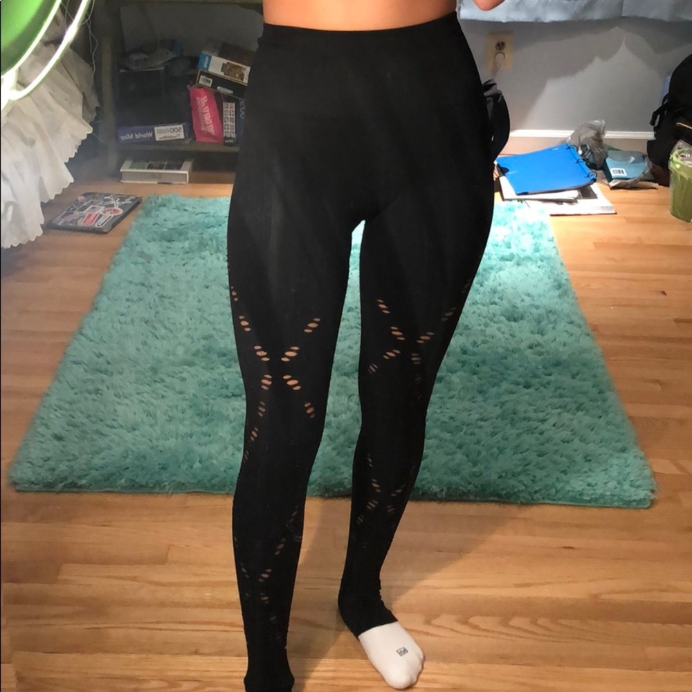 High waisted black leggings with small holes